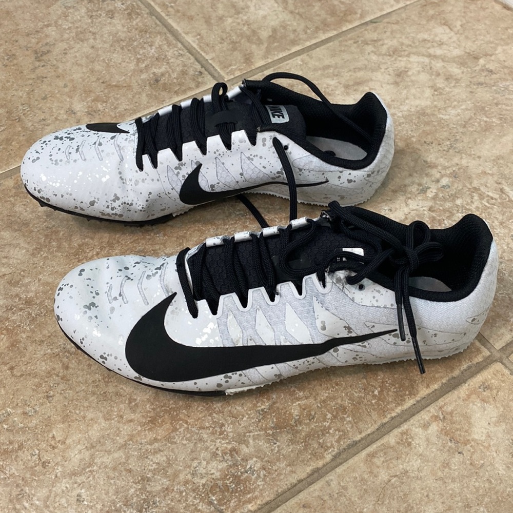 Brand new Nike Racing Cleats